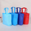 Portable colorful nonwoven bag pp spun bond non woven fabric supplier