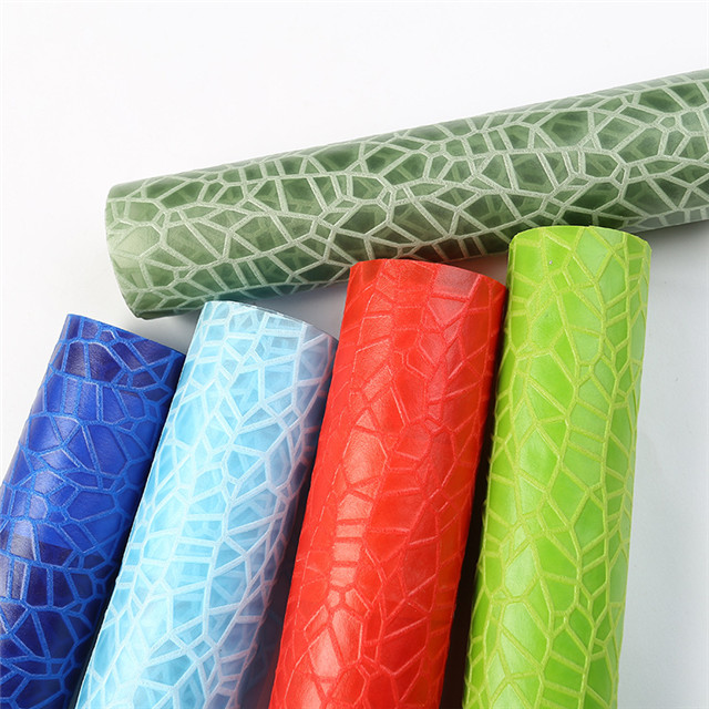 Bark tree pattern embossed nonwoven fabric for packing product