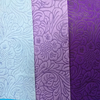 Trendy embossed non-woven fabric flower wrapping paper roll Multiple designs