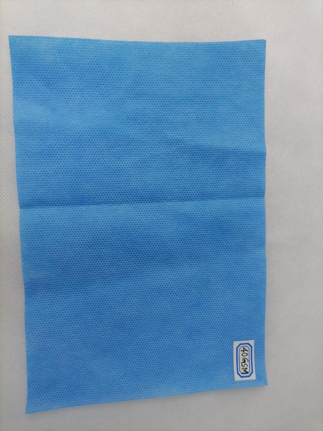 Medical Gown Pp Nonwoven SMS Fabric Polypropylene Spunbonded Nonwoven Fabric for Protective Clothing